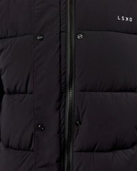 Woman wearing Go-To Puffer Long Jacket - Black | Model:Ella | Size:S