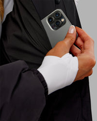 Woman wearing Go-To Puffer Long Jacket - Black | Model:Ella | Size:S