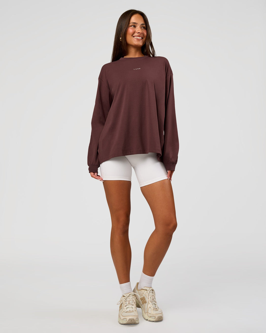 Woman wearing Go-To Long Sleeve FLXCotton Oversized Tee - Cocoa Powder-White | Model:Bianca | Size:S