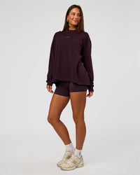 Woman wearing Go-To Long Sleeve FLXCotton Oversized Tee - Midnight Plum-White | Model:Bianca | Size:S | Thumbnail Index: 4