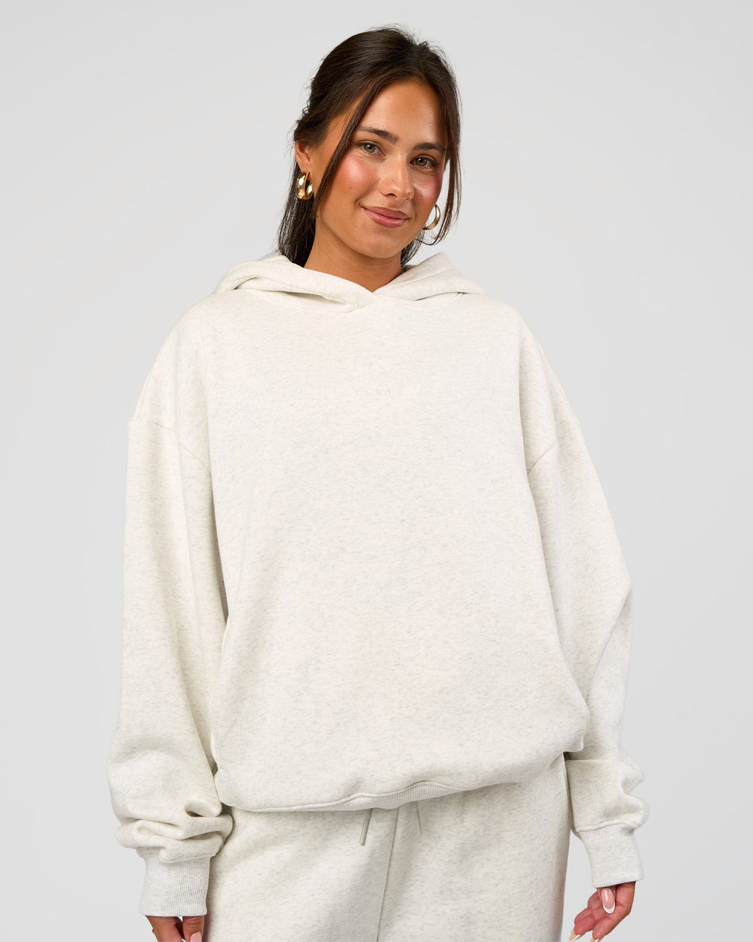 Woman wearing Go-To Oversized Hoodie - Silver Marl | Model:Bianca | Size:S