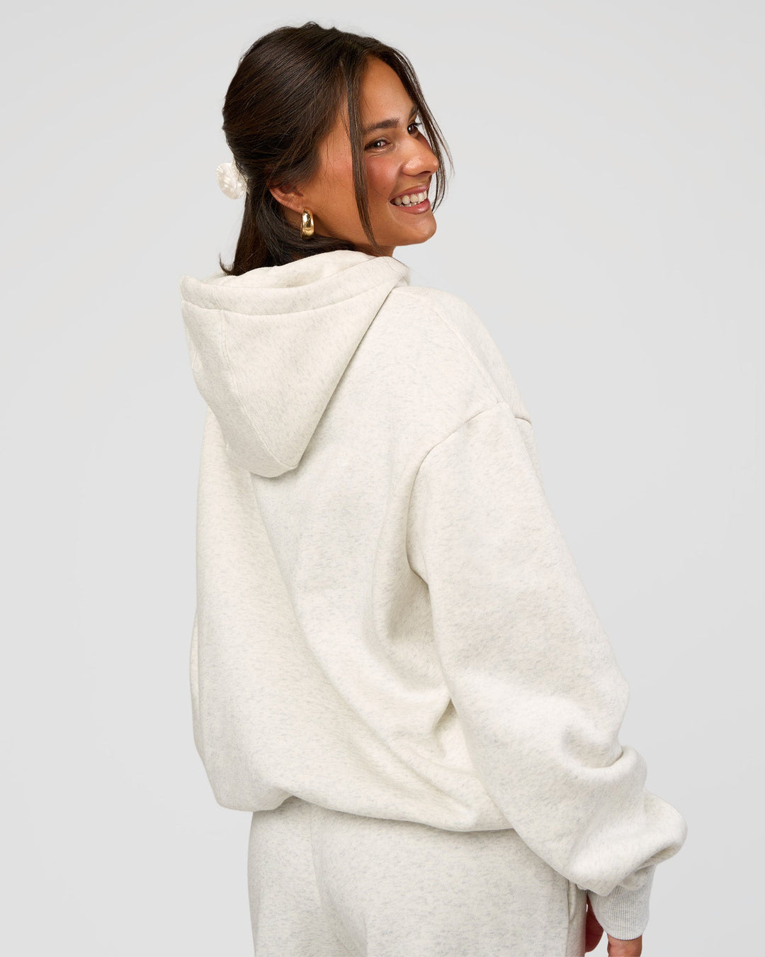 Woman wearing Go-To Oversized Hoodie - Silver Marl | Model:Bianca | Size:S