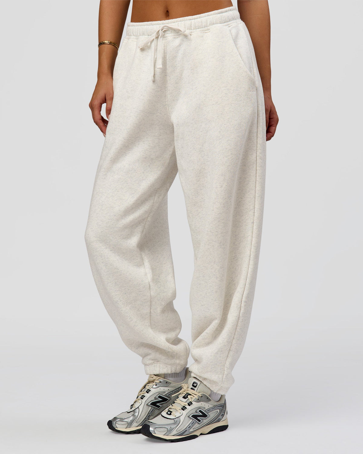Woman wearing Go-To Oversized Track Pant - Silver Marl | Model:Bianca | Size:S
