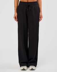 Woman wearing Go-To Wide Leg Track Pant - Black | Model:Bianca | Size:S