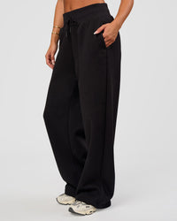 Woman wearing Go-To Wide Leg Track Pant - Black | Model:Bianca | Size:S