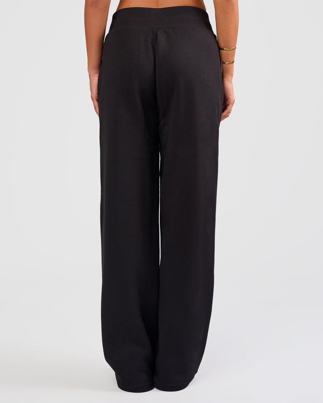 Woman wearing Go-To Wide Leg Track Pant - Black | Model:Bianca | Size:S
