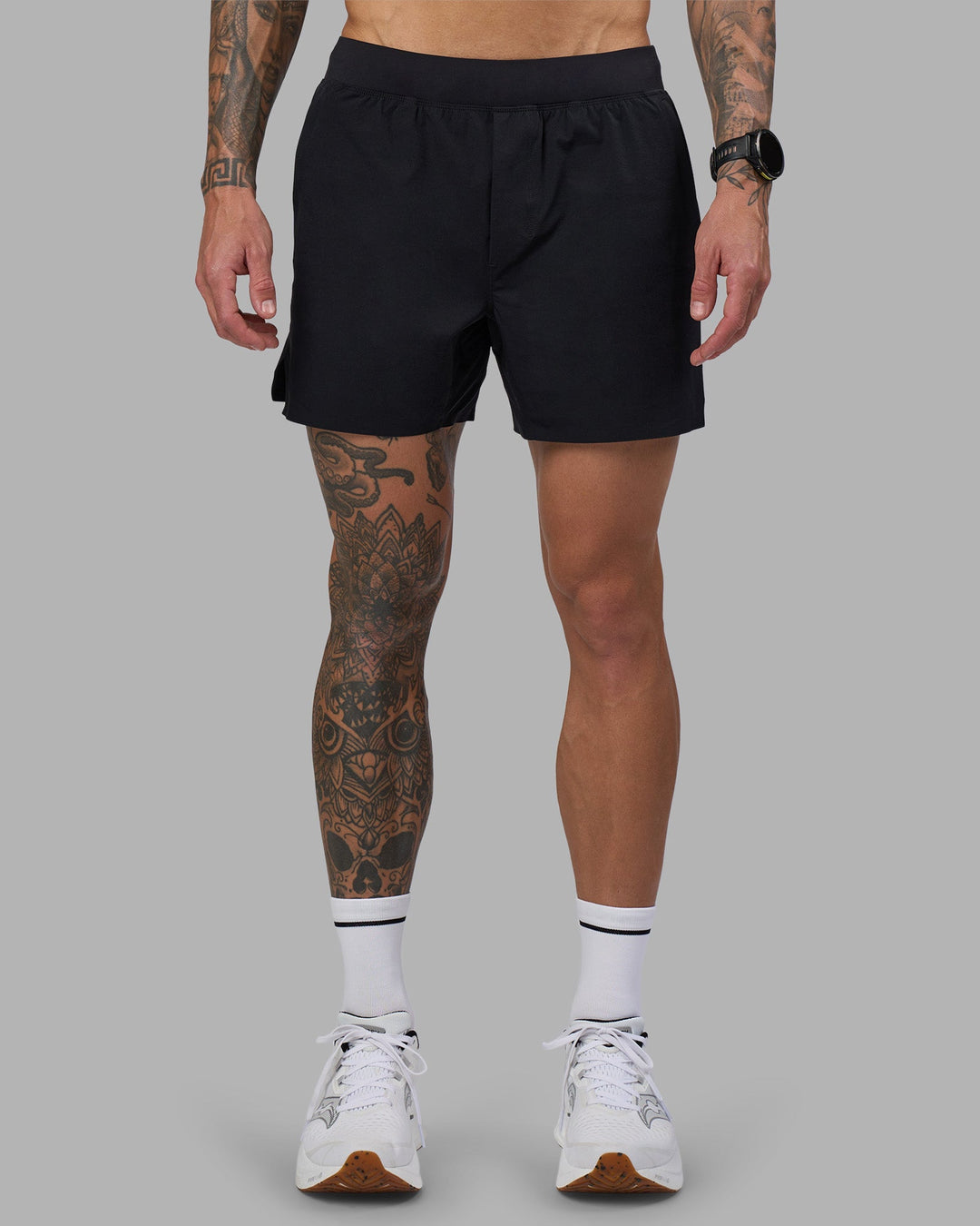 Man wearing Hybrid 5&quot; Short - Black-Reflective | Model:Tommy | Size:S