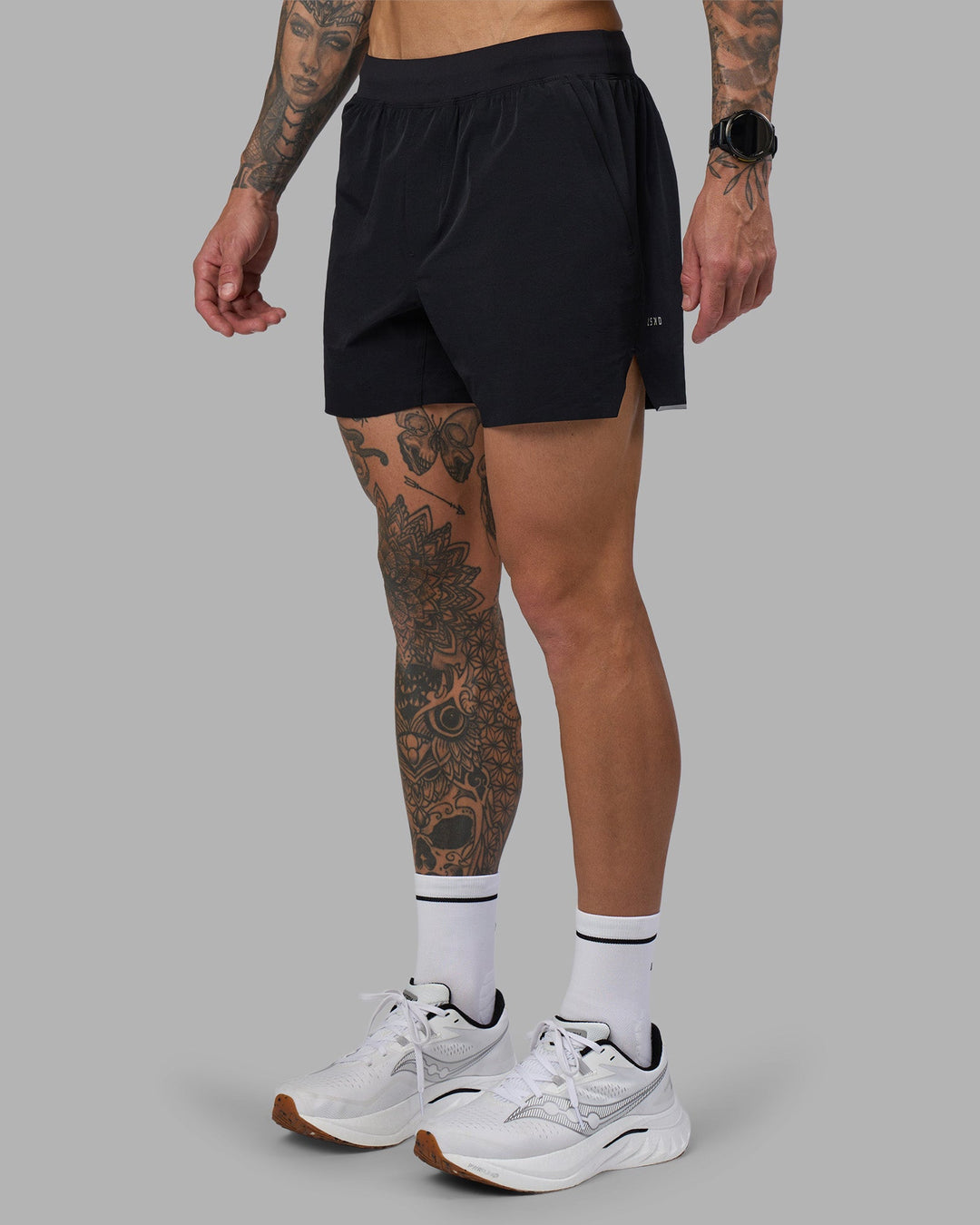 Man wearing Hybrid 5&quot; Short - Black-Reflective | Model:Tommy | Size:S