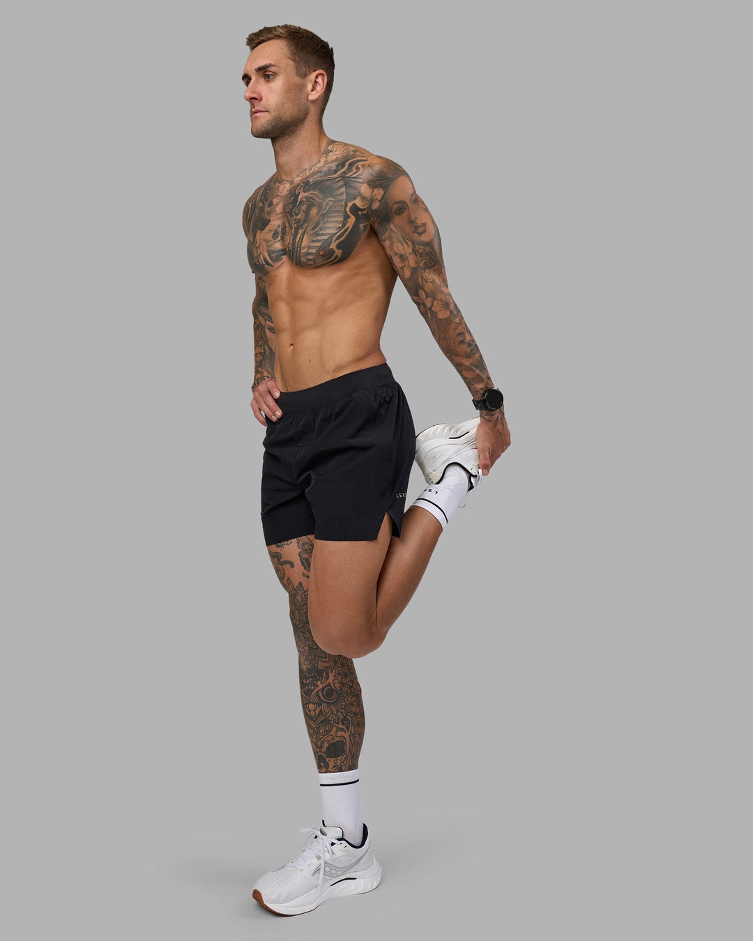 Man wearing Hybrid 5&quot; Short - Black-Reflective | Model:Tommy | Size:S