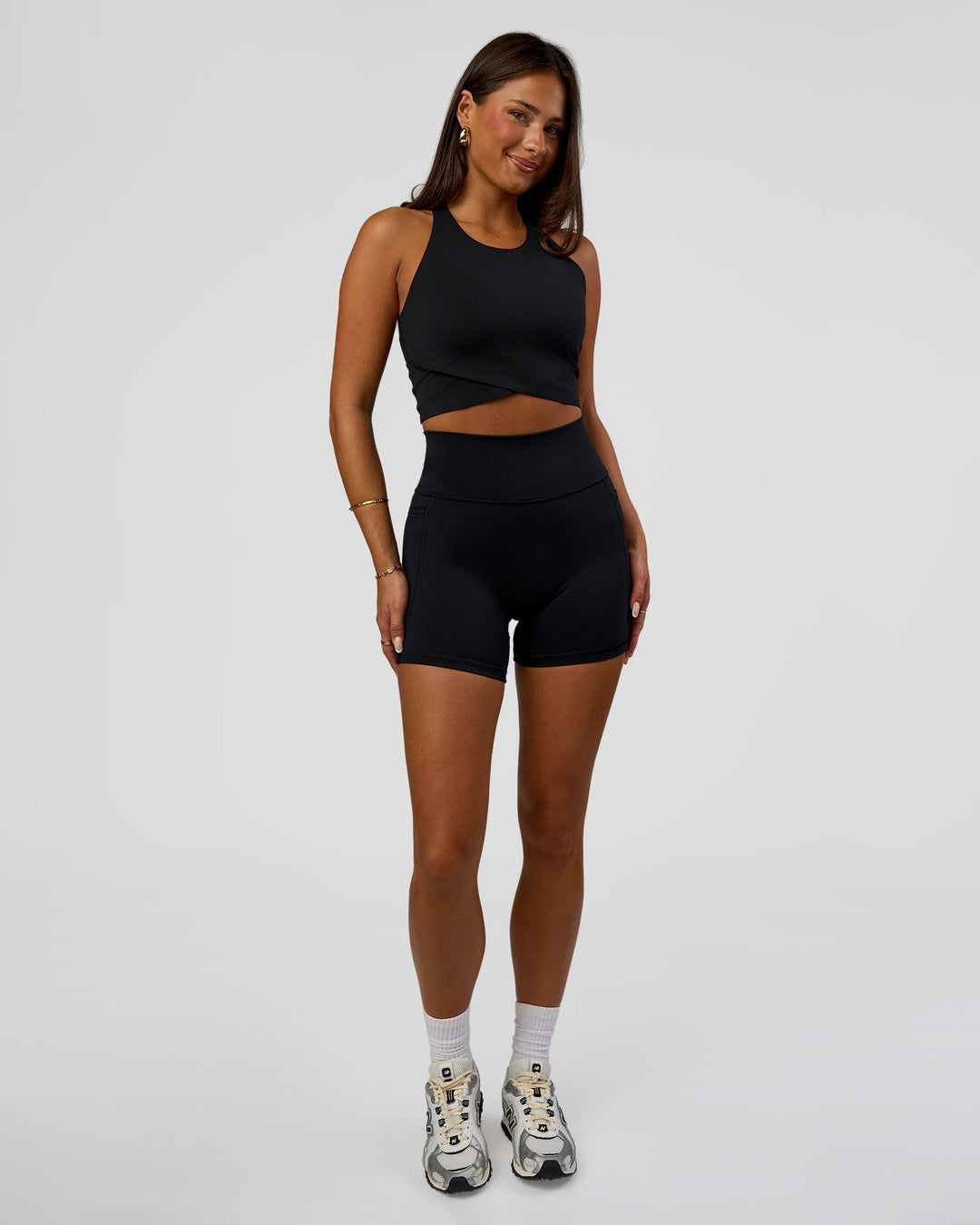 Woman wearing Hybrid Performance Crossover Tank - Black | Model:Bianca | Size:S