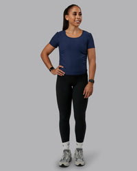 Woman wearing Ignite Ribbed Scrunch Side Cropped Tee - Future Navy | Size:S | Model:Tylah