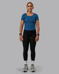 Woman wearing Ignite Ribbed Scrunch Side Cropped Tee - Indigo | Size:S | Model:Tylah