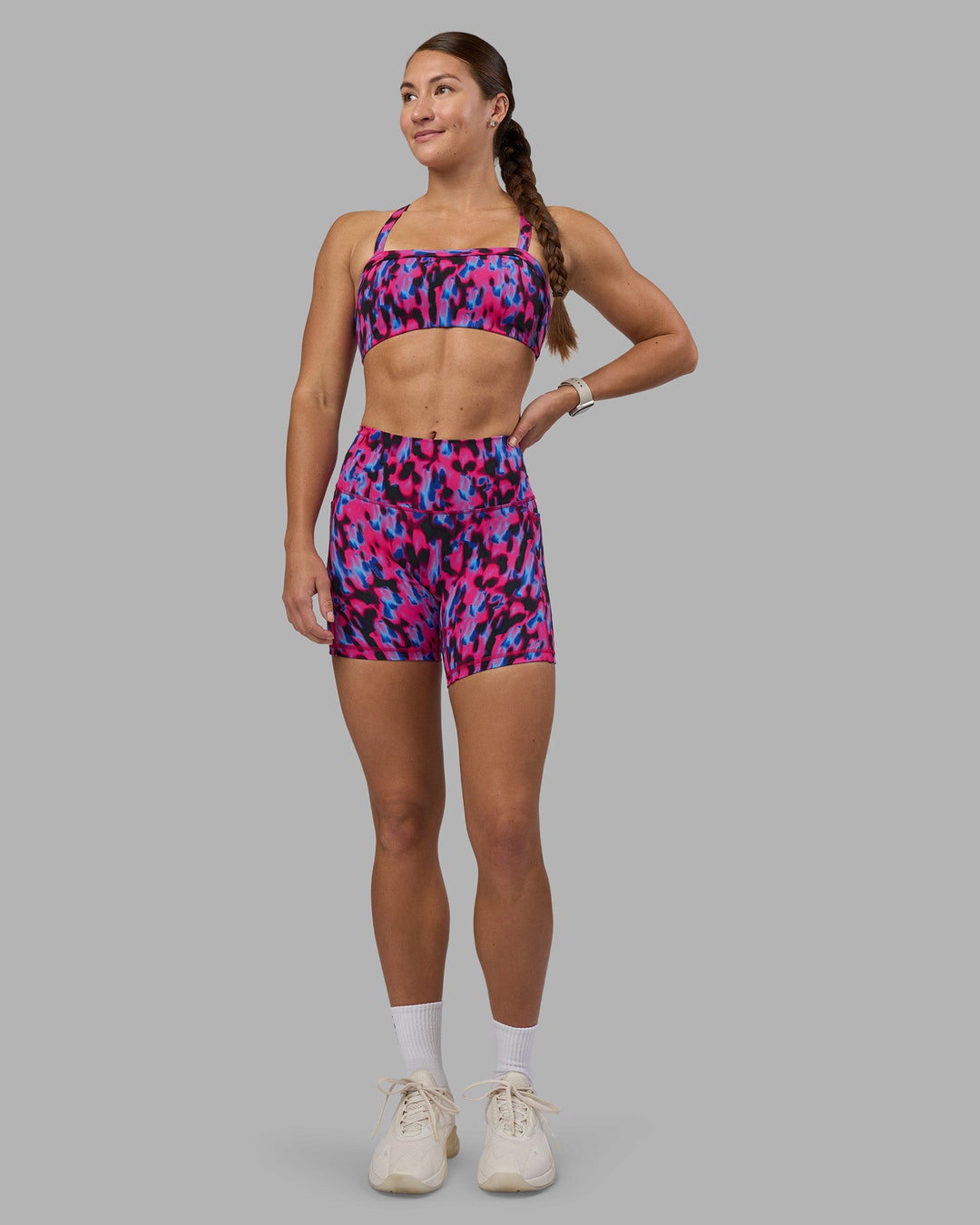 Woman wearing Inspired Sports Bra - Pink Luminous | Model:Hannah | Size:S