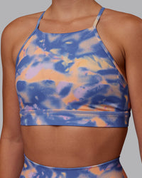 Woman wearing Lift High Neck Sports Bra - Apricot Mist | Model:Charlize | Size:S