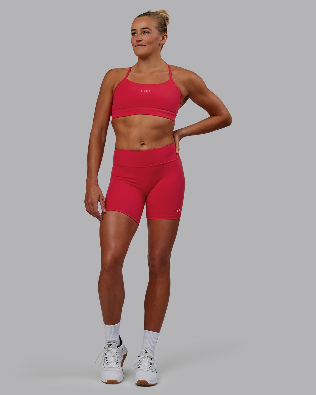 Woman wearing Lift Sports Bra - Scarlet