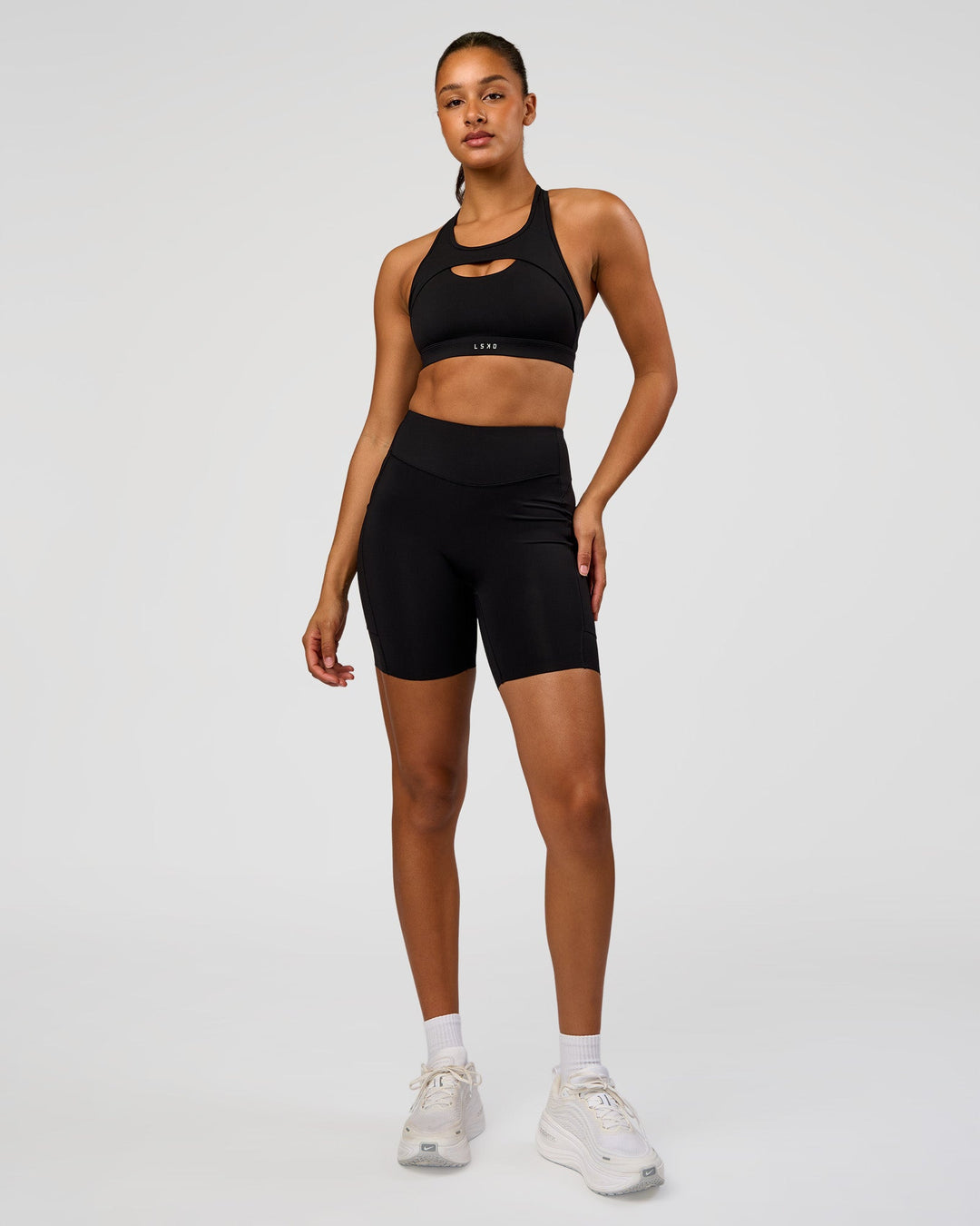Woman wearing LimitLift Sports Bra - Black | Model:Rosie | Size:S - view 4