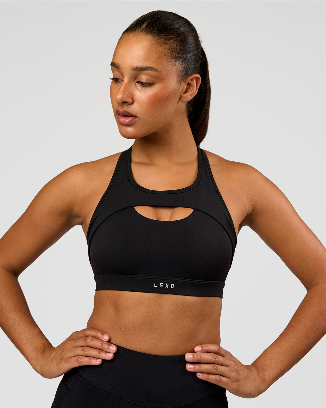 Woman wearing LimitLift Sports Bra - Black | Model:Rosie | Size:S - view 3
