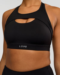Woman wearing LimitLift Sports Bra - Black | Model:Rosie | Size:S | Thumbnail Index: 0