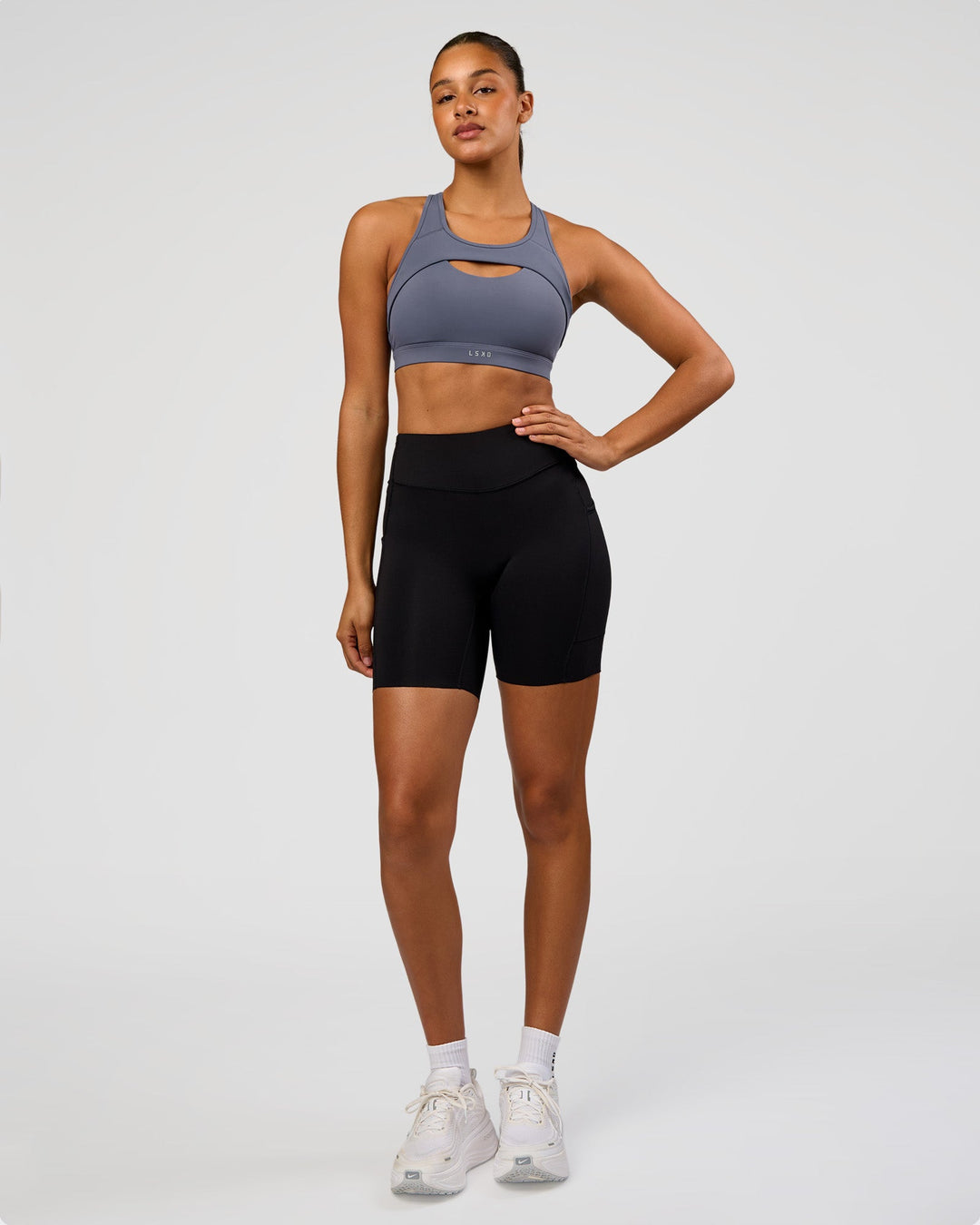 Woman wearing LimitLift Sports Bra - Night Shadow | Model:Rosie | Size:S