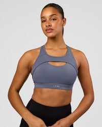 Woman wearing LimitLift Sports Bra - Night Shadow | Model:Rosie | Size:S