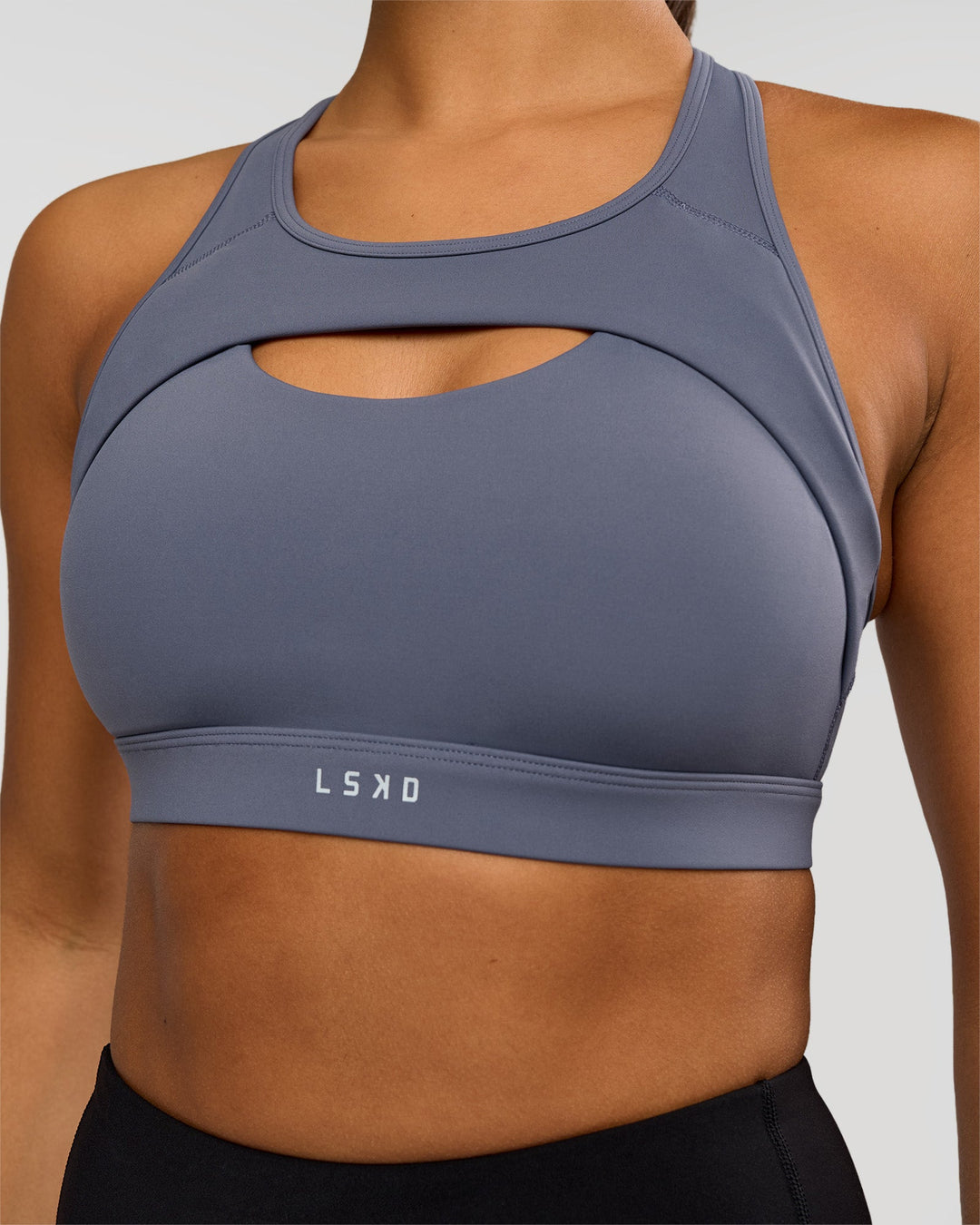 Woman wearing LimitLift Sports Bra - Night Shadow | Model:Rosie | Size:S