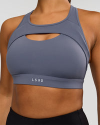 Woman wearing LimitLift Sports Bra - Night Shadow | Model:Rosie | Size:S