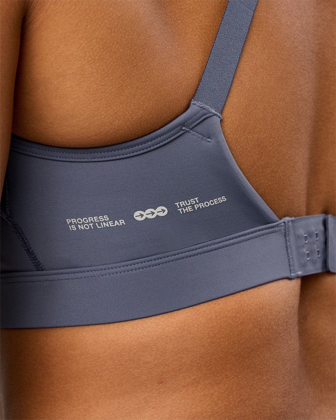 Woman wearing LimitLift Sports Bra - Night Shadow | Model:Rosie | Size:S