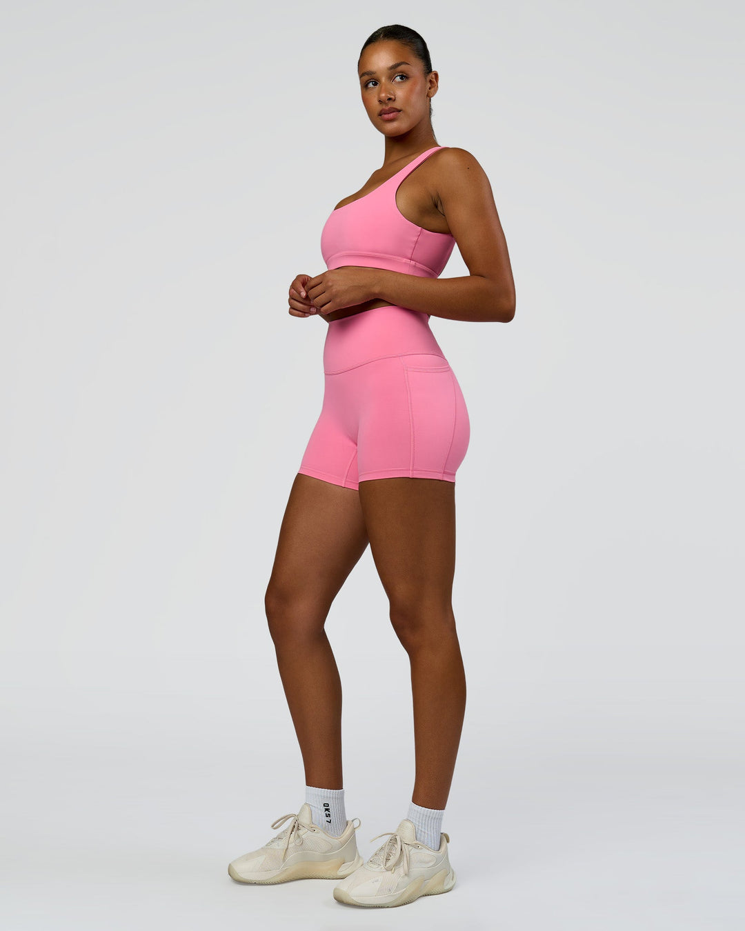 Model wearing Limitless Sports Bra - Candy Pink | Model:Rosie | Size:S