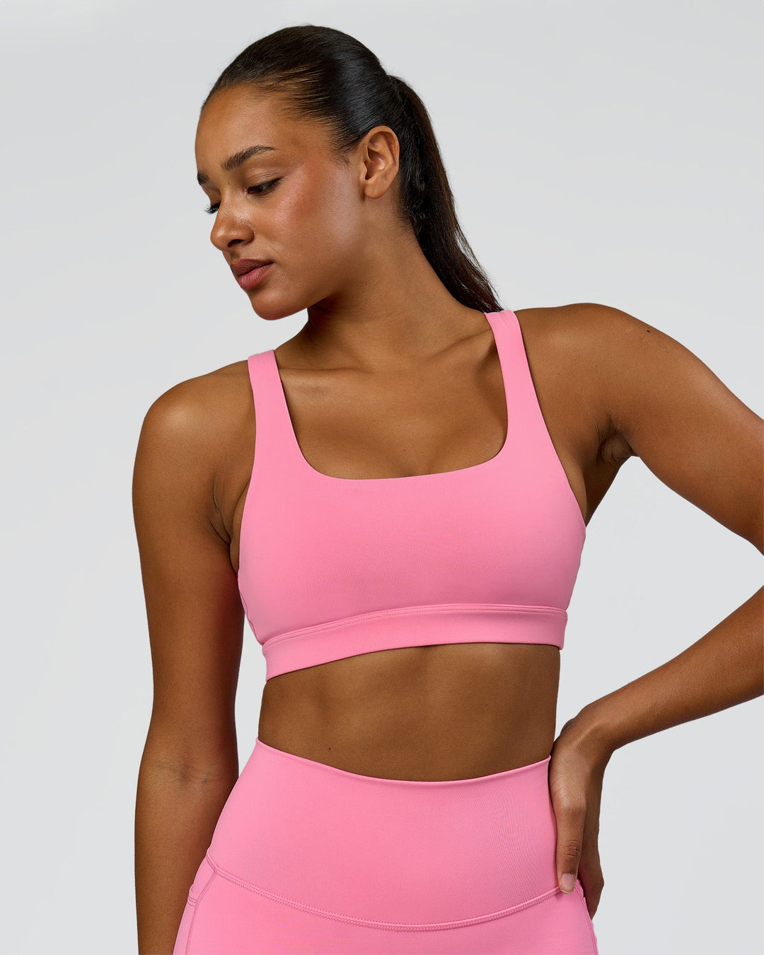 Model wearing Limitless Sports Bra - Candy Pink | Model:Rosie | Size:S