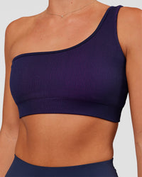 Woman wearing Lively Seamless Ribbed Sports Bra - Future Navy-Ultra Fuchsia | Model:Amity | Size:S