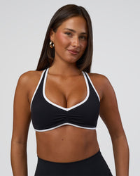 Woman wearing Luminous Sports Bra - Black-White | Model:Bianca | Size:S | Thumbnail Index: 0