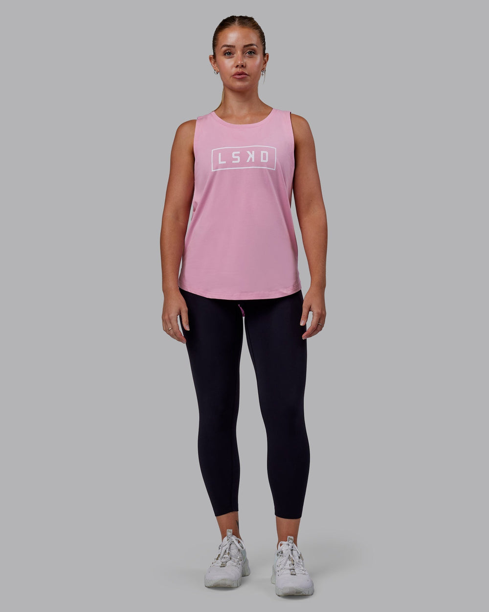 Woman wearing Luna FLXCotton Longline Tank - Bubblegum-White