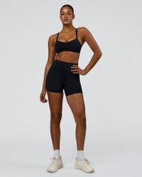 Woman wearing Luna Sports Bra - Black | Model:Rosie | Size:S
