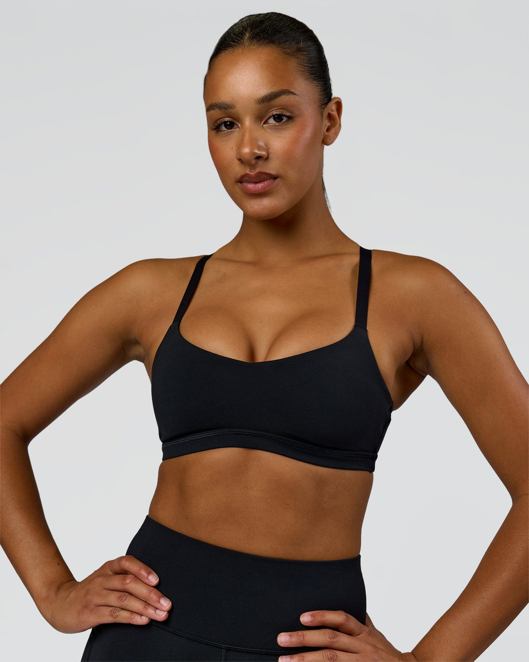 Woman wearing Luna Sports Bra - Black | Model:Rosie | Size:S