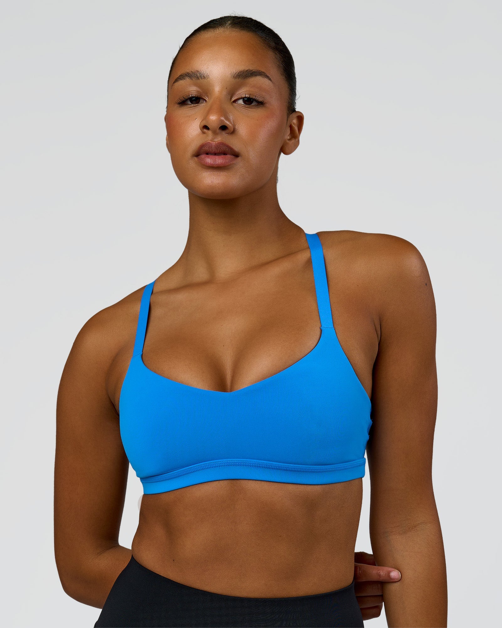 Woman wearing Luna Sports Bra - Palace Blue | Model:Rosie | Size:S