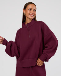 Woman wearing MVP 1/2 Zip Oversized Sweater - Cherry Lacquer | Model:Brylee | Size:S