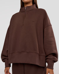 Woman wearing MVP 1/2 Zip Oversized Sweater - Hot Chocolate | Model:Brylee | Size:S