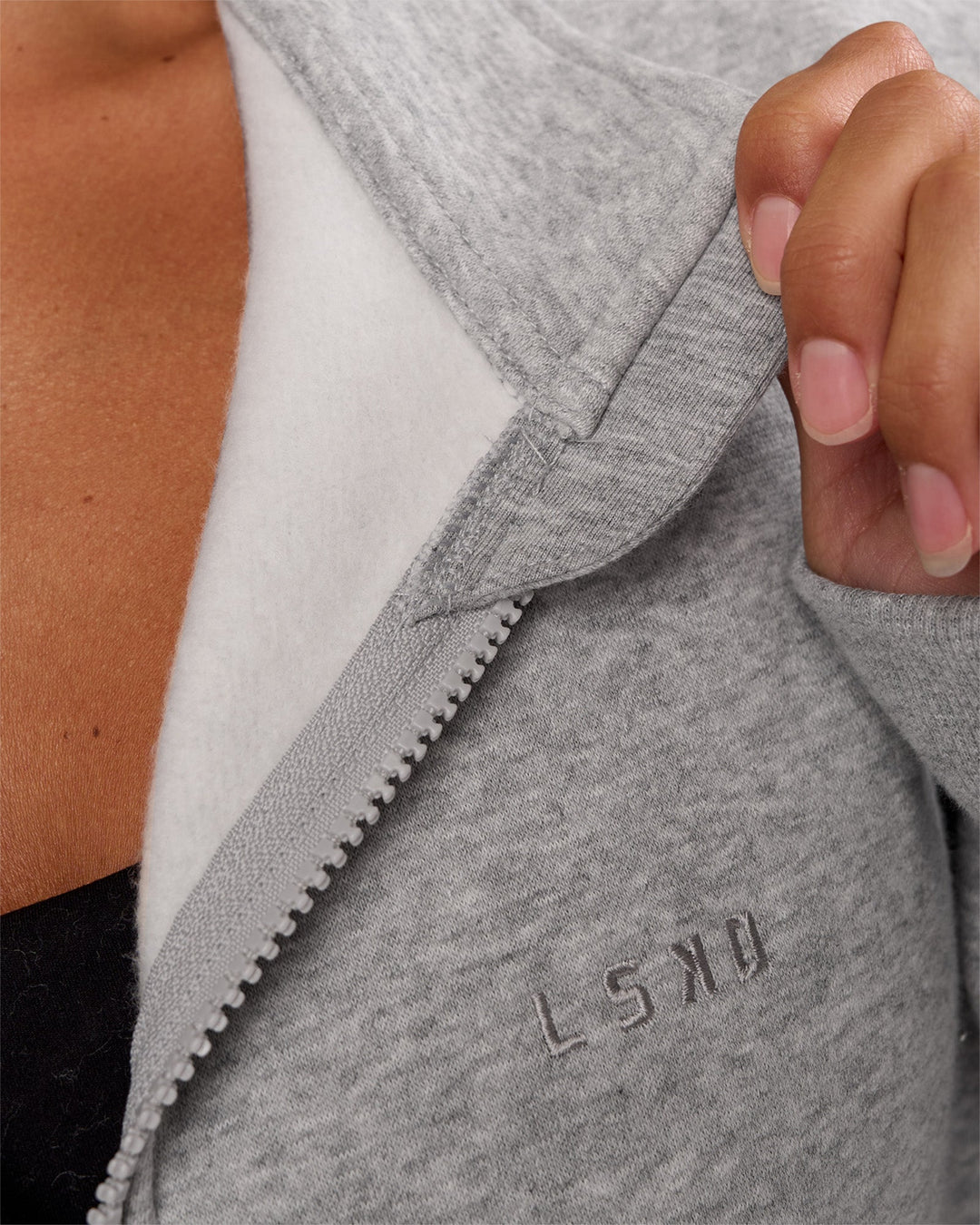 Woman wearing MVP 1/2 Zip Oversized Sweater - Light Grey Marl | Model:Brylee | Size:S