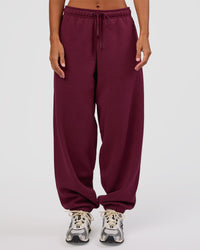 Woman wearing MVP Oversized Slouchy Fit Track Pant - Cherry Lacquer | Model:Brylee | Size:S