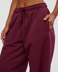 Woman wearing MVP Oversized Slouchy Fit Track Pant - Cherry Lacquer | Model:Brylee | Size:S