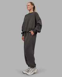Woman wearing MVP Oversized Slouchy Fit Track Pant - Dark Storm | Model:Neve | Size:S