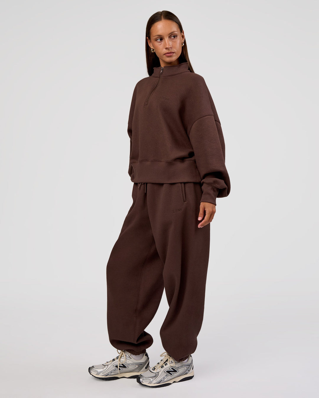 Woman wearing MVP Oversized Slouchy Fit Track Pant - Hot Chocolate | Model:Brylee | Size:S