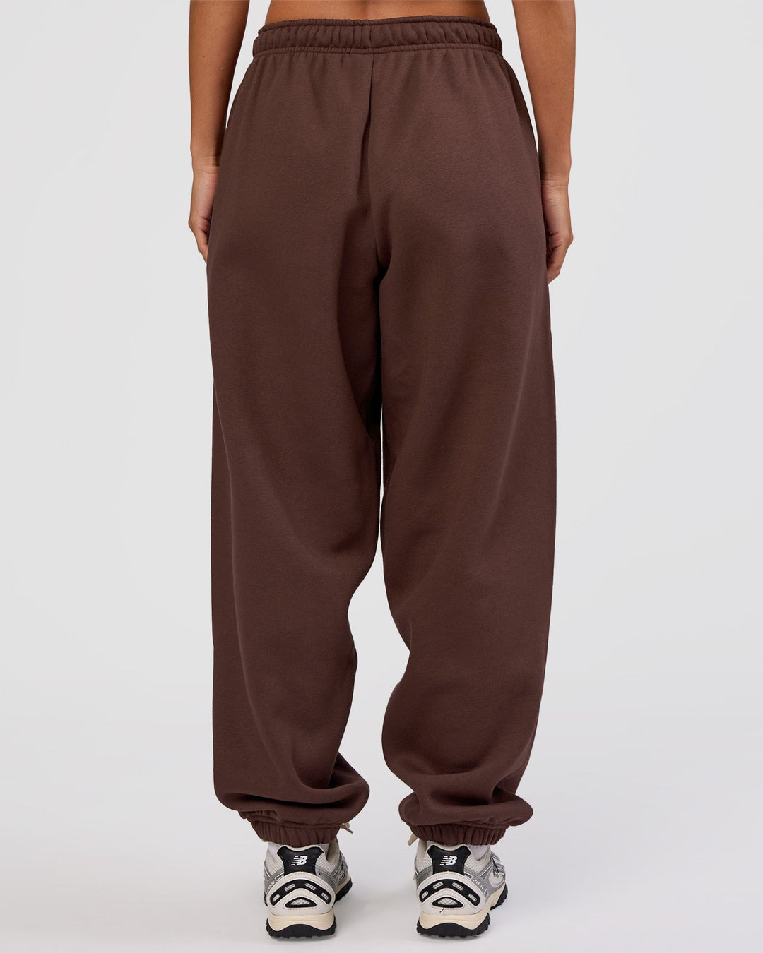 Woman wearing MVP Oversized Slouchy Fit Track Pant - Hot Chocolate | Model:Brylee | Size:S
