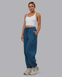 Woman wearing MVP Oversized Slouchy Fit Track Pant - Indigo | Model:Paris | Size:S