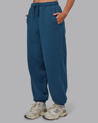 Woman wearing MVP Oversized Slouchy Fit Track Pant - Indigo | Model:Paris | Size:S