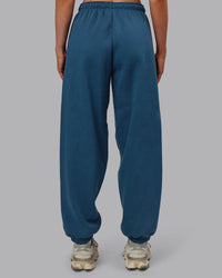 Woman wearing MVP Oversized Slouchy Fit Track Pant - Indigo | Model:Paris | Size:S