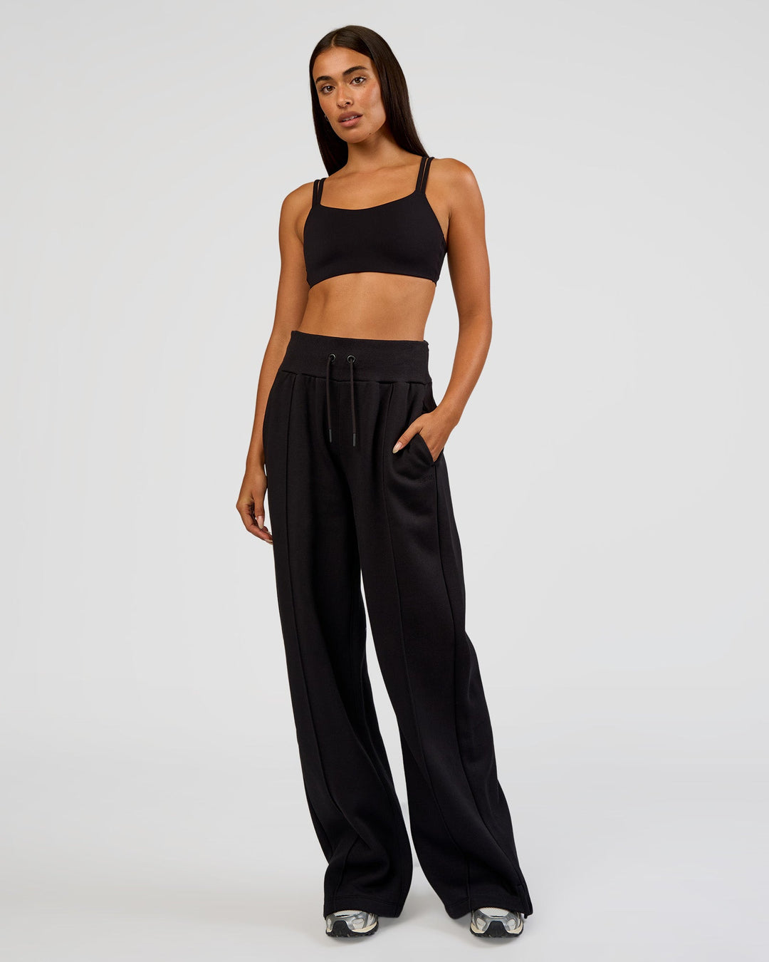 Woman wearing MVP Wide Leg Tall Track Pant - Black | Model:Ruby | Size:S