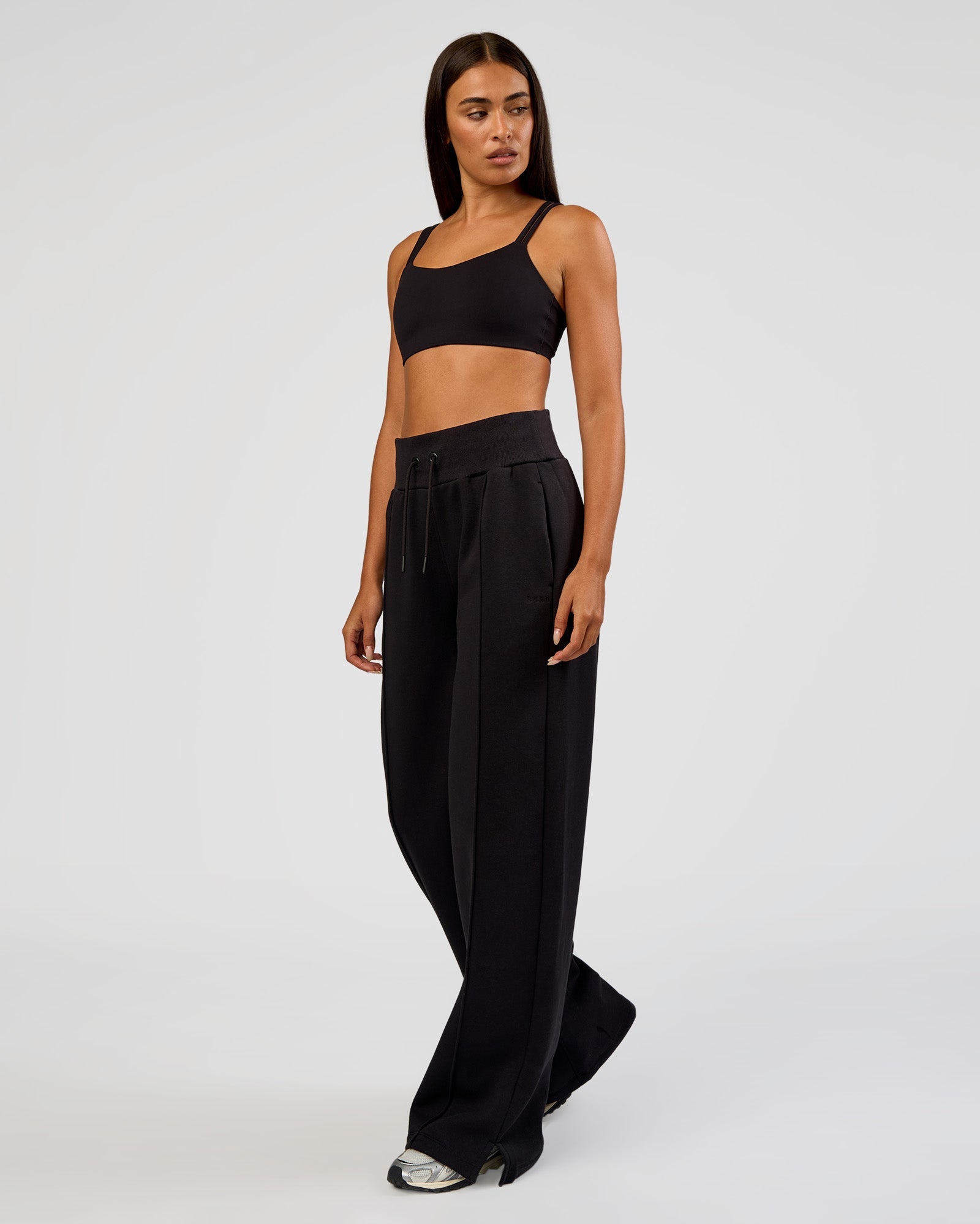Woman wearing MVP Wide Leg Tall Track Pant - Black | Model:Ruby | Size:S