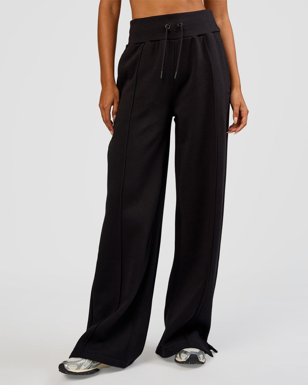 Woman wearing MVP Wide Leg Tall Track Pant - Black | Model:Ruby | Size:S