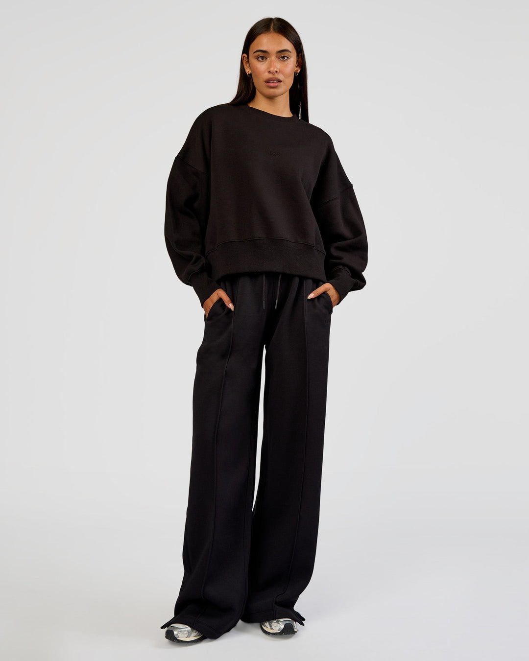 Woman wearing MVP Wide Leg Tall Track Pant - Black | Model:Ruby | Size:S